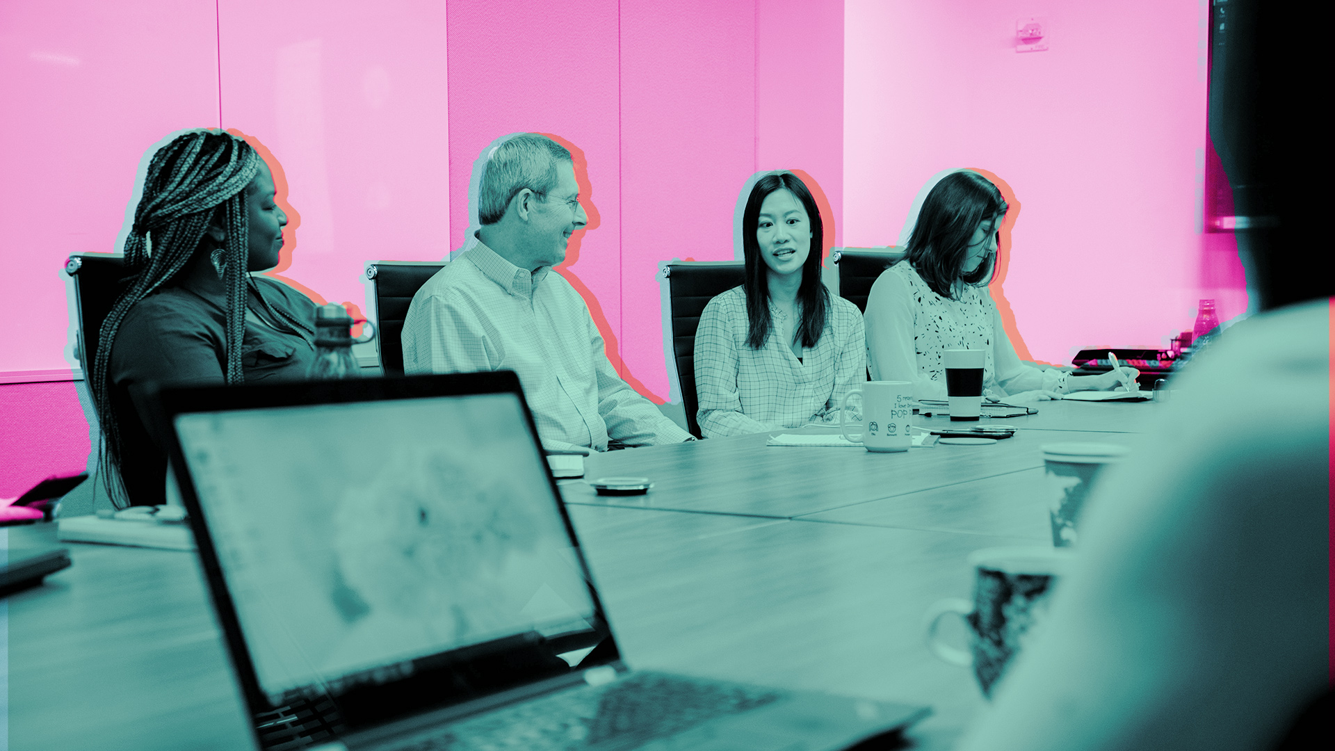 G&Sers sitting around conference table